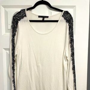 White House Black Market size XL sweater.  White with black lace down the arms.